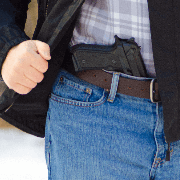 A picture of someone concealed carrying.