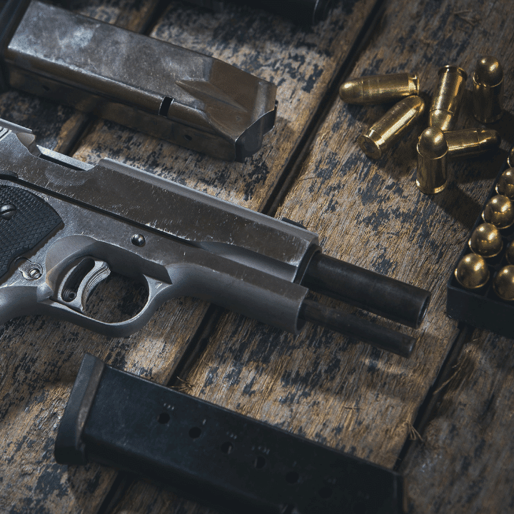 A picture of a pistol and ammo.